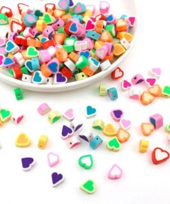 70010-2 - Tira de pucca/fimo corazones de colores
