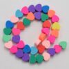 70010-8 - Tira de pucca/fimo corazones colores