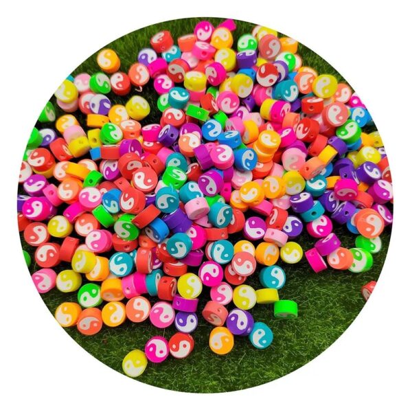 70010-9 - Tira de pucca/fimo ying yang colores