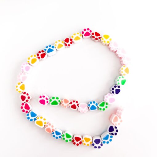 70010-20 - Tira de pucca/fimo huella perro colores