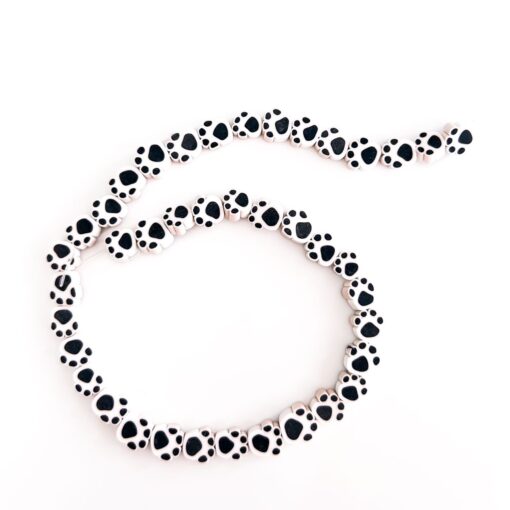 70010-21 - Tira de pucca/fimo huella blanco y negro