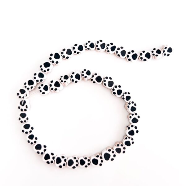 70010-21 - Tira de pucca/fimo huella blanco y negro