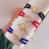 41029 - Pulsera armada cristales con dije