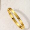 41062 - pulsera acero corazones con cristales dorado