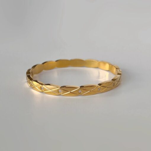 41073 - pulsera acero dorada entrelazada