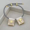 41086 - Pulsera tejida doble dije blanco