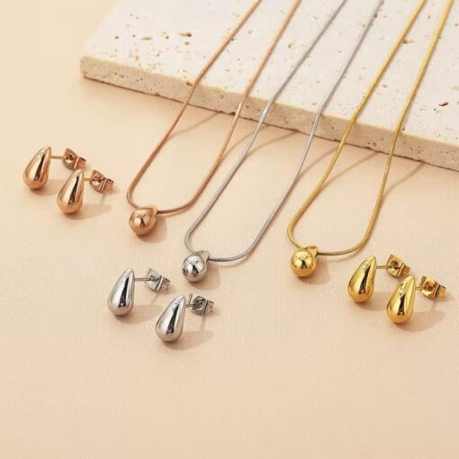 21091 - Set Dorado Zarcillos y collar tipo gota