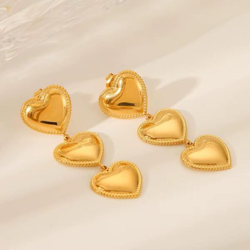 80173 - Zarcillos triple corazon acero