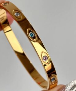 41118 - Pulsera dorada acero ojos turcos incrustados