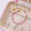 41133-2 Pulsera rosa acero ojos turcos