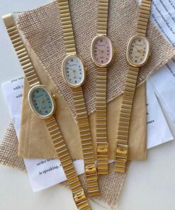 Reloj #5 Dorado Ovalado