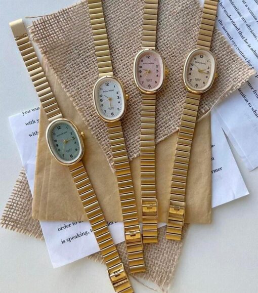 Reloj #5 Dorado Ovalado