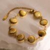 41141 - Pulsera acero dorada multi almejas