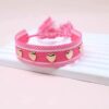 41083 - Pulsera tela rosada con corazon