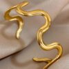 41061 - Pulsera Acero ondas dorada