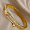 41078 - Pulsera Acero dorada estrella