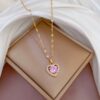 21085 - Collar armado corazon con cristal rosado