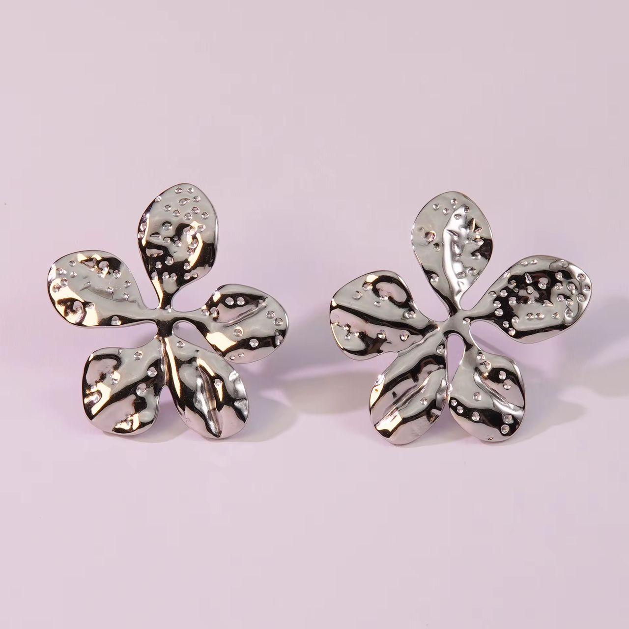 80021 - zarcillos flor plateado