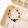 41010-4 Pulsera Negro armada trebol con balin