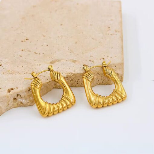 80085 - Zarcillos dorados acero tipo U