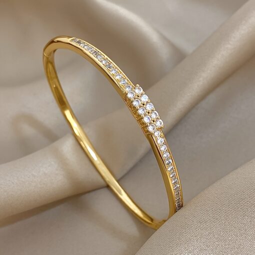 41074 - Pulsera Acero dorada multi cristales