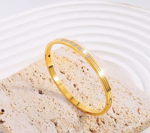 41066 - pulsera acero dorada con cristales