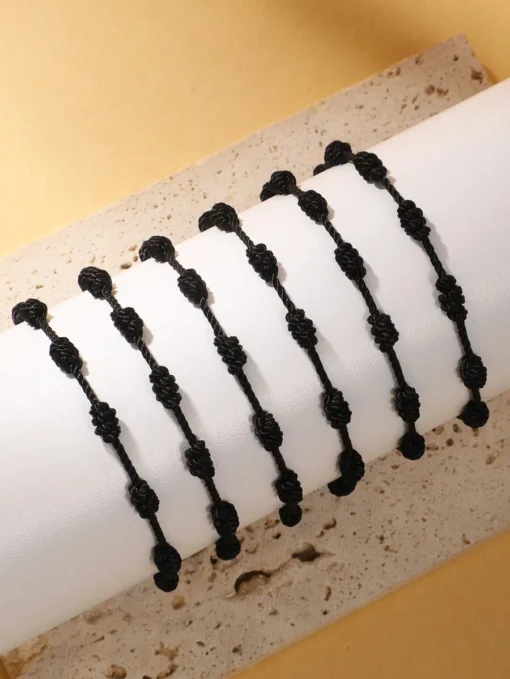 41081-1 Pulsera 7 nudos negro