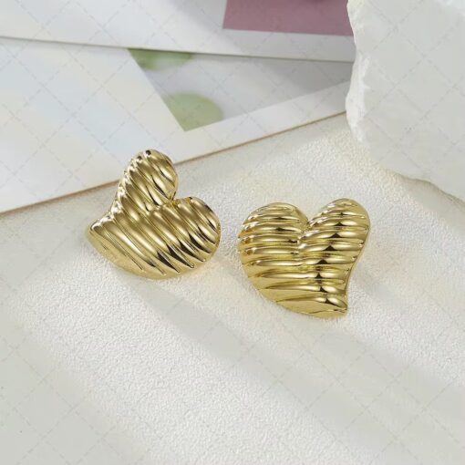 80107 - Zarcillos dorados corazon con lineas