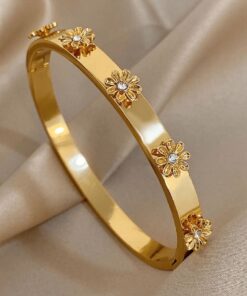 41038 - Pulsera Acero Dorado multi flores con cristal