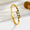 41063-1 Pulsera Acero dorado tornillo con cristales negros