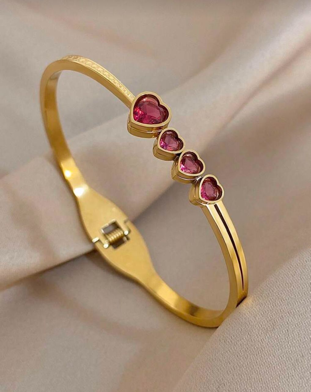 41031 - Pulsera Acero dorada 4 corazon