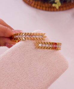 41114 - Pulsera acero dorado multi espigas