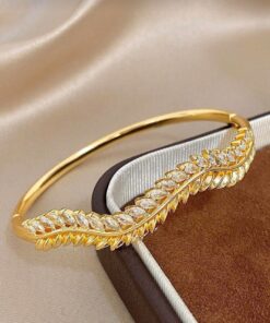 41122 - Pulsera acero dorado multiespigas con cristal