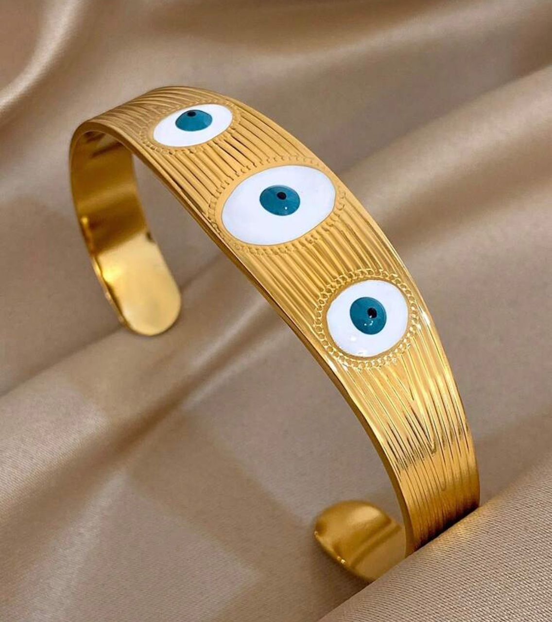 41130 - Pulsera acero dorado triple ojo