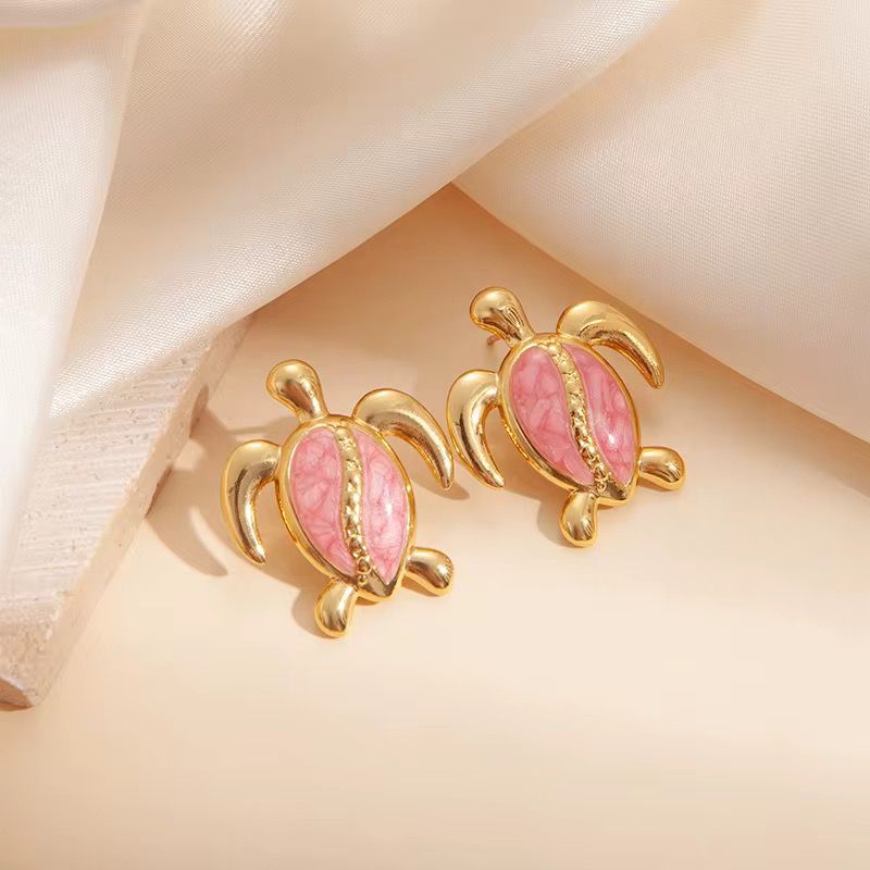 80244-4 Zarcillos tortuga acero fucsia