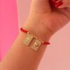 41168-2 Pulsera roja balines escapulario cruz / corazon