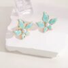 80031-2 Zarcillos acero flor turquesa esmaltado