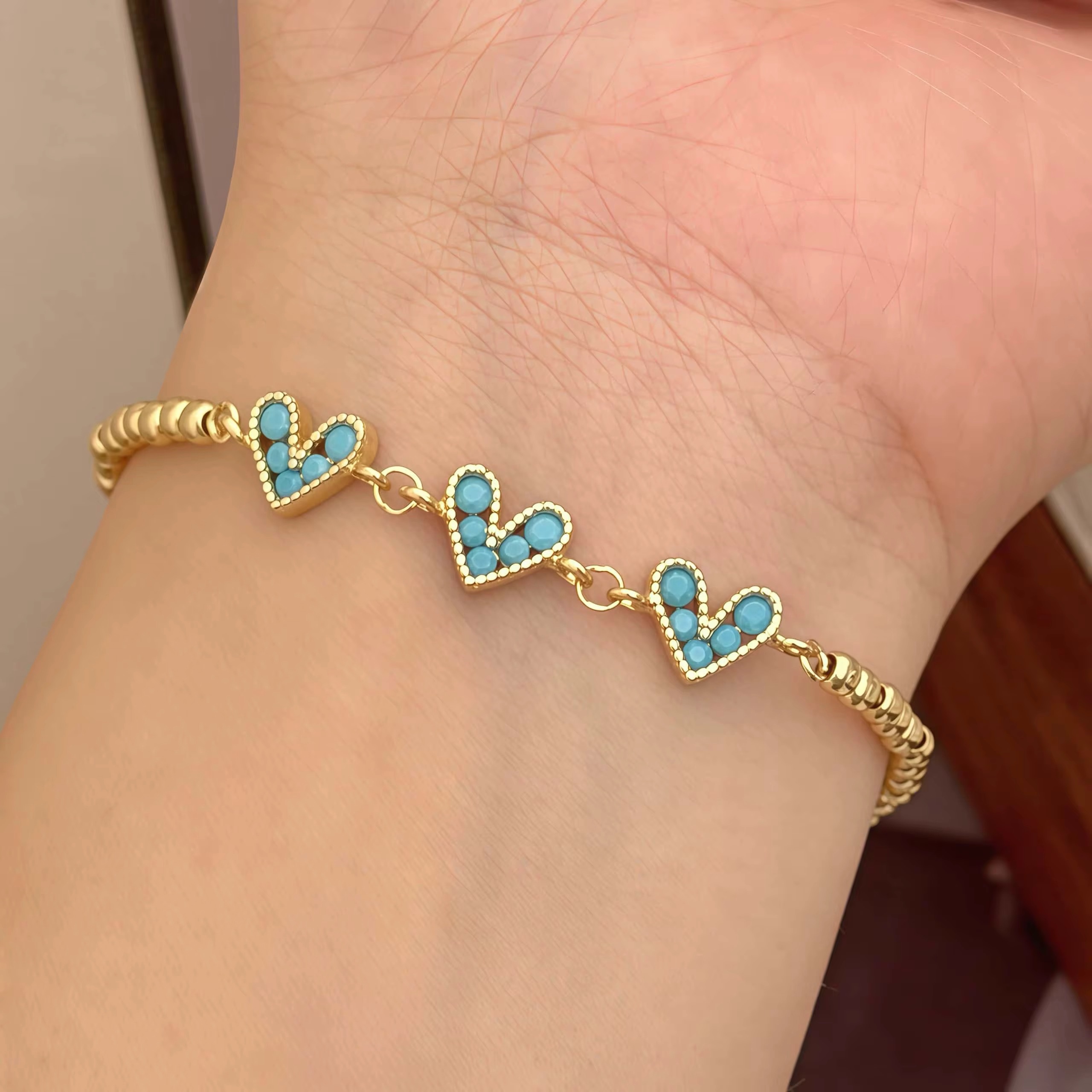 41173-6 Pulsera balines triple corazon azul claro